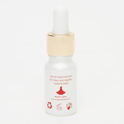 White bottle with gold cap on a white background