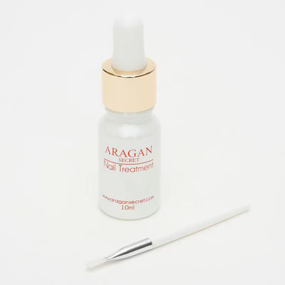 Aragan Secret nail treatment bottle with a dropper on a white background