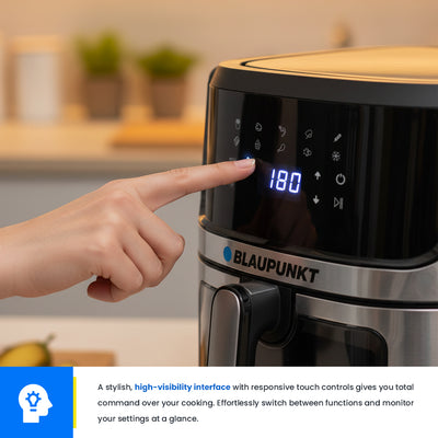 Person adjusting settings on a Blaupunkt kitchen appliance with a blurred kitchen background