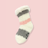Striped sock with white, gray, and pink on a pink background