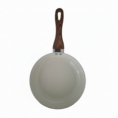 Frying pan with wooden handle on a white background