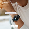 Smartwatch on a wrist with a blurred background, featuring the Polaroid brand.