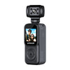 A black Polaroid handheld action camera with a top-mounted lens module and a small front display showing a selfie, isolated on a white background.