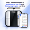 A digital body fat and body composition scale with a built-in LED light, shown alongside a smartphone displaying health report charts. The image includes promotional text at the top: 'Smart, powerful insights to build muscle, lose fat, and track your progress over time' on a light blue and white gradient background.
