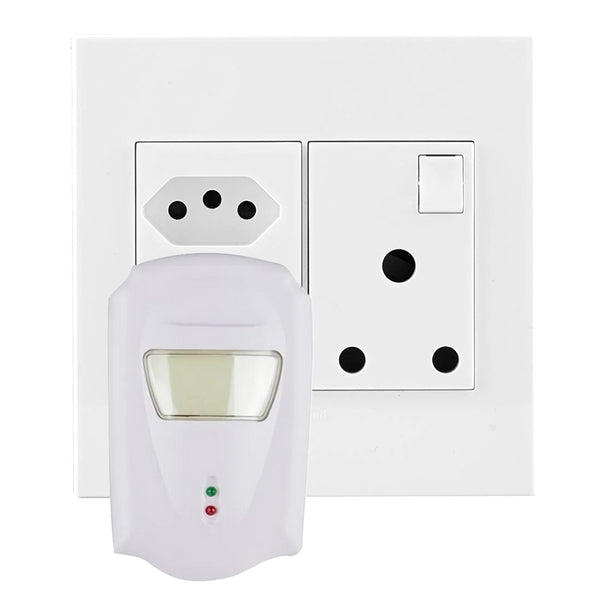 A ultrasonic pest device plugged into a wall socket on a white background
