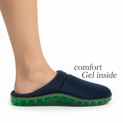 Navy slipper with green sole on a white background, featuring text 'comfort Gel inside'.
